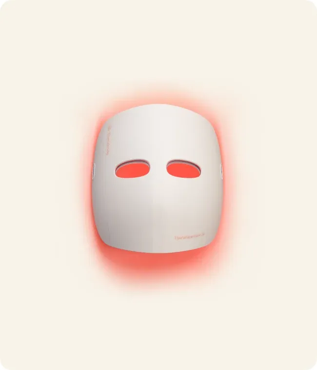 Therabody TheraFace Mask Glo LED mask on a beige background